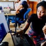 2 employees at computer